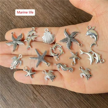 JunKang 180pcs naključno mešani serijo breskev srce listov živali palm luna zvezda serije ocean obesek DIY zapestnico, ogrlico, zaradi česar